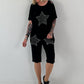 T-Shirt mit Häkelstern-Nieten-Cut-Outs - schwarz