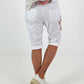 Short baggy shorts with crochet flowers and sequins - white