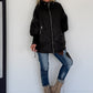Oversized Steppjacke mit Stulpenärmeln und Kapuze - schwarz