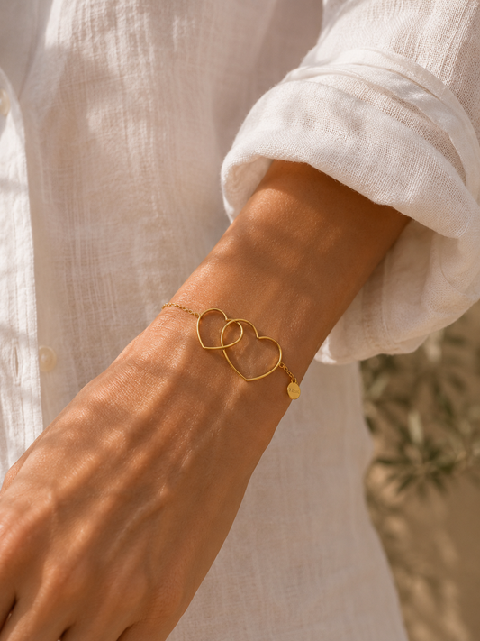 Giuno Armband mit Doppel-Herzanhänger - gold