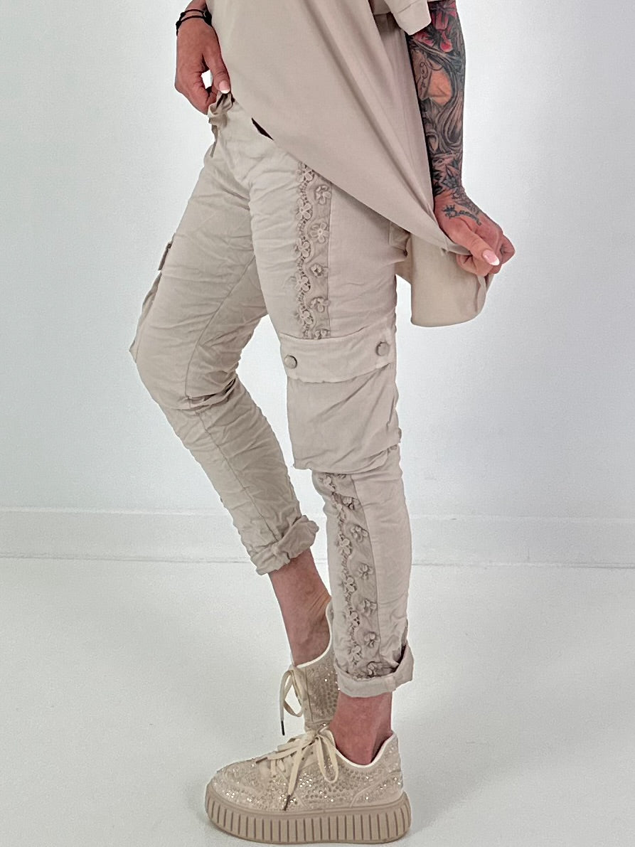 Trousers with crochet flowers and patch pockets - beige