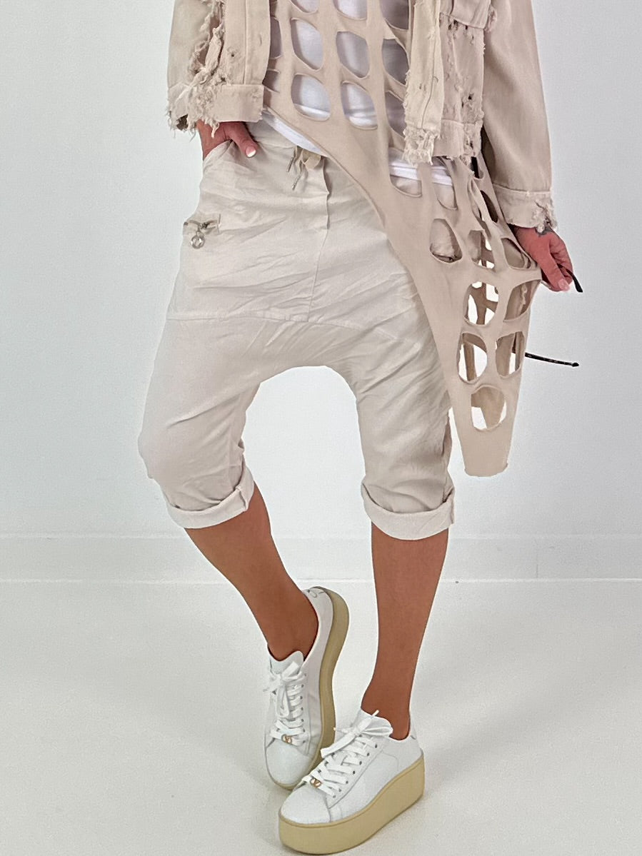 Kurze Baggy mit Zipper Details - beige