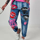 Jeanshose mit Statement Printmix - blau-mehrfarbig