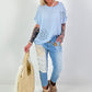 Linen shirt with crocheted floral appliqués - light blue