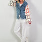 Denim jacket with crocheted sleeves