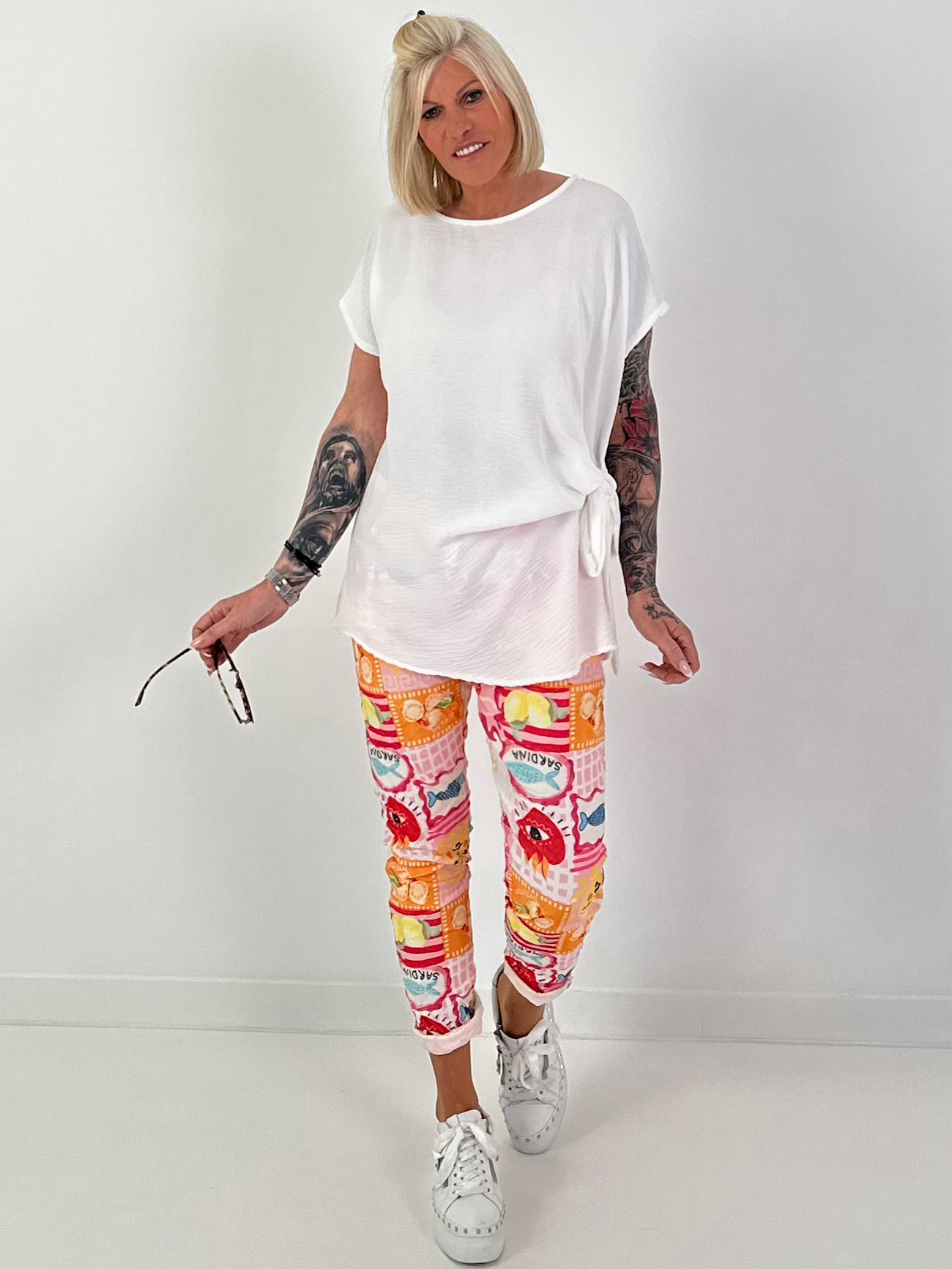 Blouse-style top with side tie knot - white