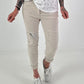 Hose mit Nieten und Paillettendetails - beige