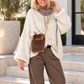 Kuschelige Oversized Strickjacke mit Außennähten - beige