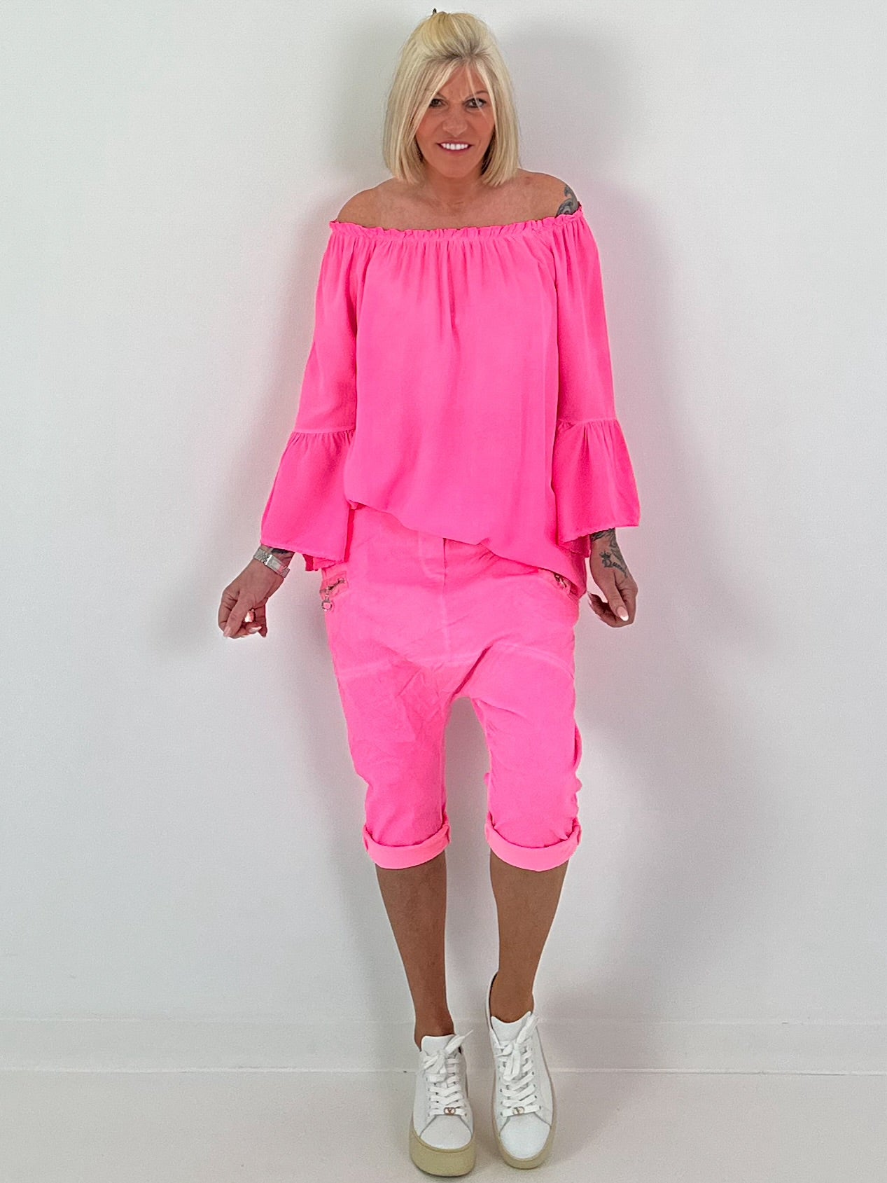 Tunic with gathered round neck and flounce sleeves - neon pink