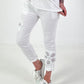 Broek met gehaakte bloemen - wit