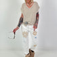 Jeans with crocheted floral appliqués - white