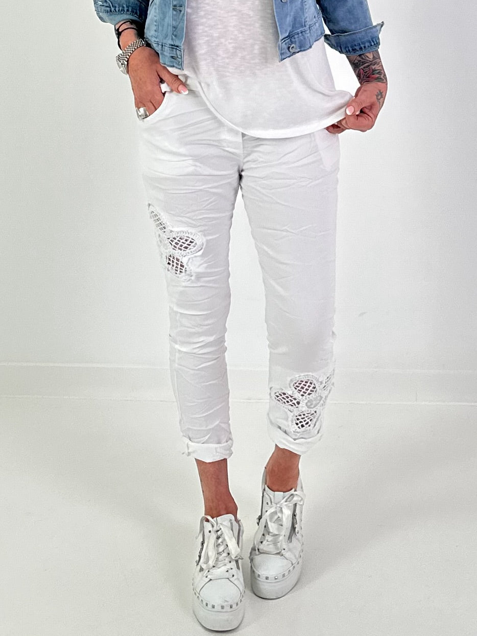 Broek met gehaakte bloemen - wit