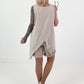 Top with cut-out and asymmetrical hem - beige