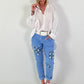 Light blue jeans with denim and sequin details