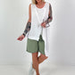 Top with cut-out and asymmetrical hem - white
