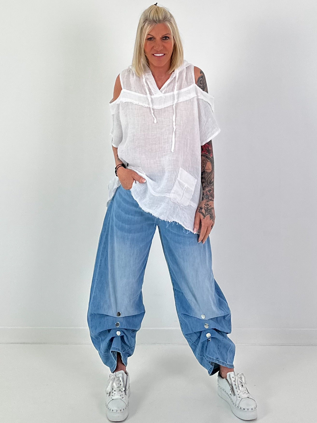 Jeans with gathered snap-button hem - denim