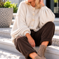 Kuschelige Oversized Strickjacke mit Außennähten - beige