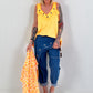 Oversized top with silver eyelets - neon orange