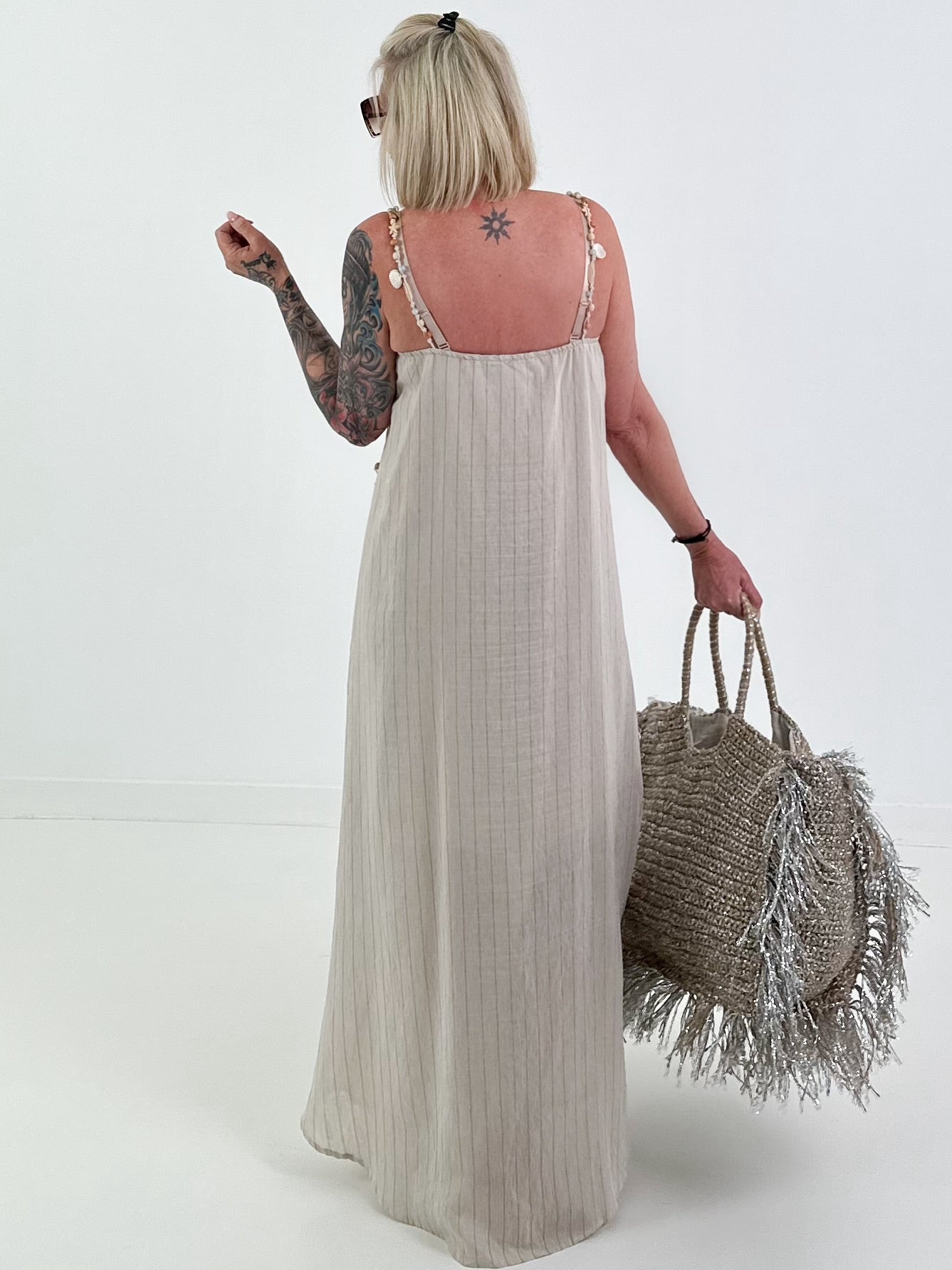 Dress with decorative straps and stripe pattern - beige