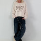 Sweater mit Linksnähten und Print - beige