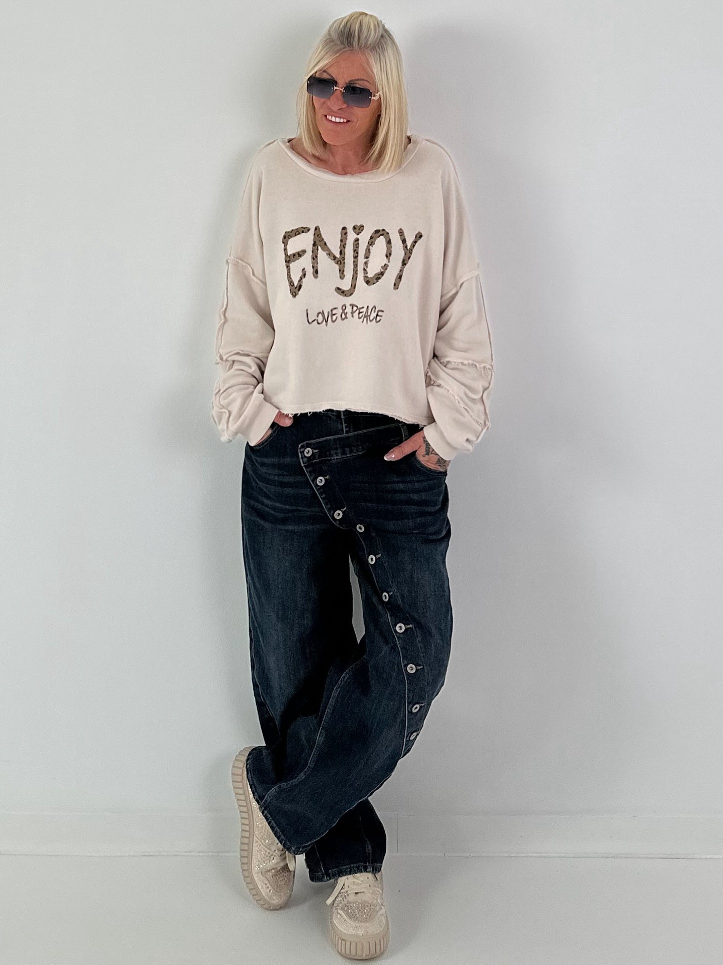 Sweater mit Linksnähten und Print - beige