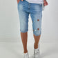 Short jeans with metal eyelets - denim
