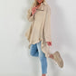 Oversized blouse met ruches – beige