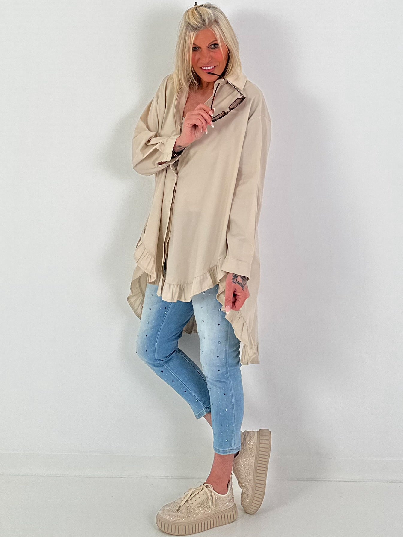 Oversized blouse met ruches – beige