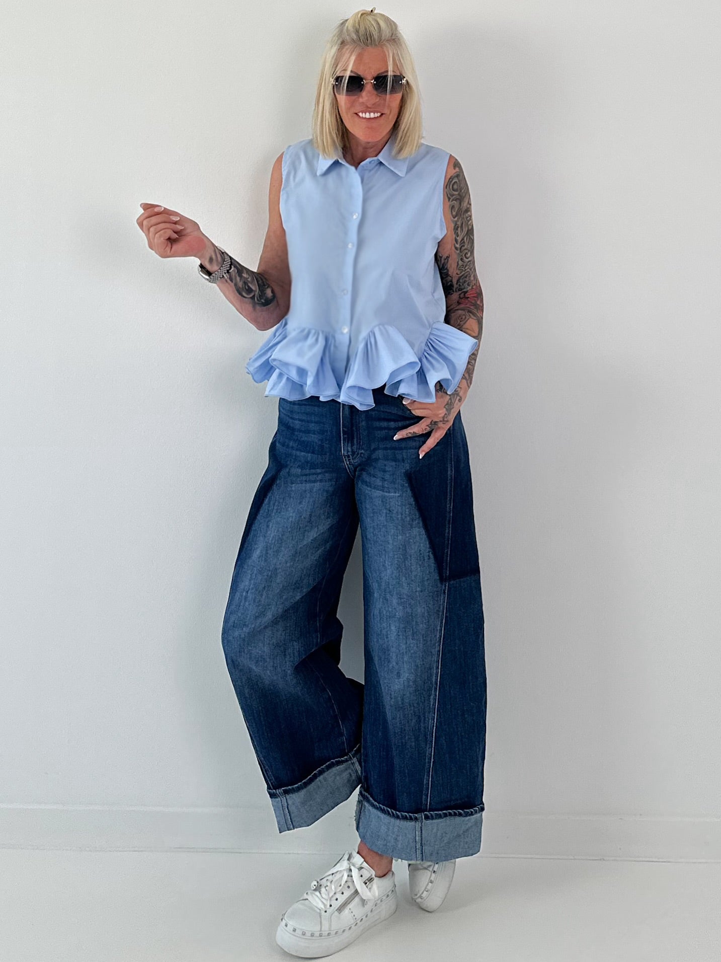 Sleeveless blouse with ruffles - light blue