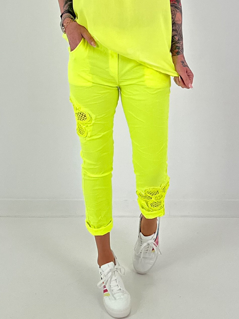 Pants with crocheted flowers - neon yellow
