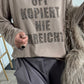 Shirt mit Leo Druck und Glitzersteinchen "Oft kopiert Nie erreicht" - taupe