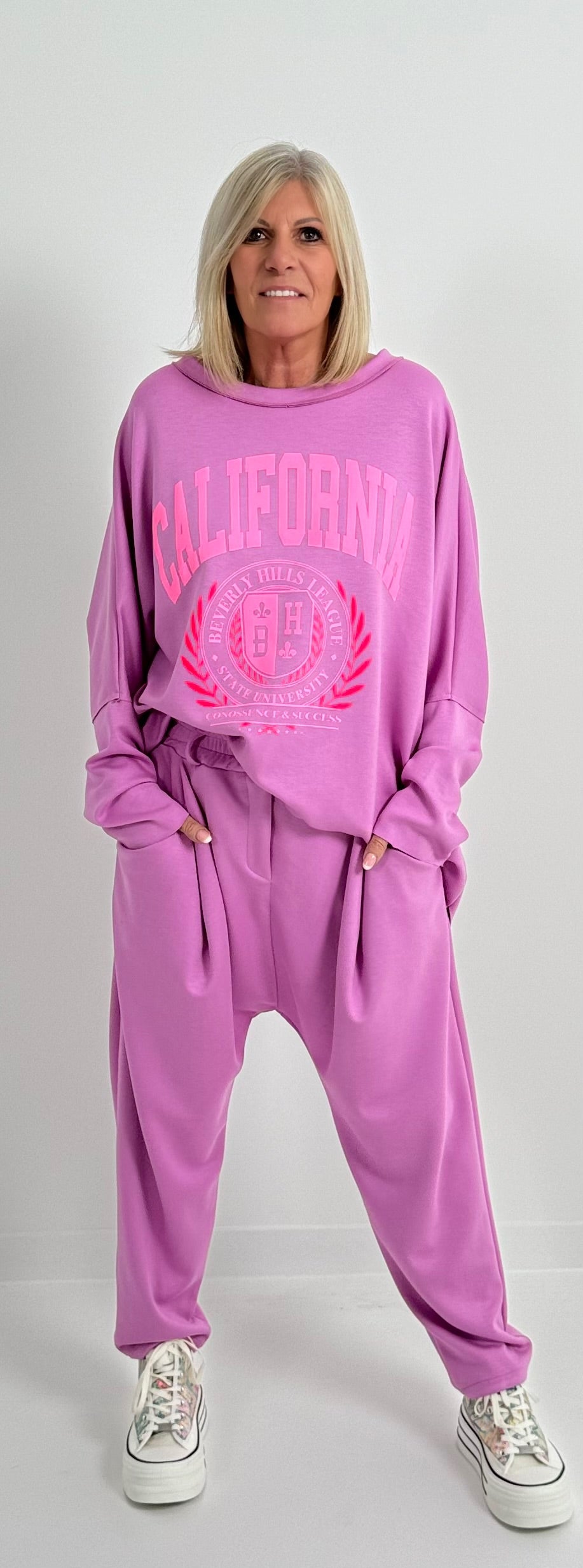 Oversized Sweatshirt mit Rückenausschnitt Modell "California" - candy-rosa