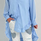 Oversized blouse met ruches aan de uiteinden, model "Xanadu" - lichtblauw