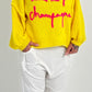 Sweatermodel "Wake me for champagne" - zonnig geel