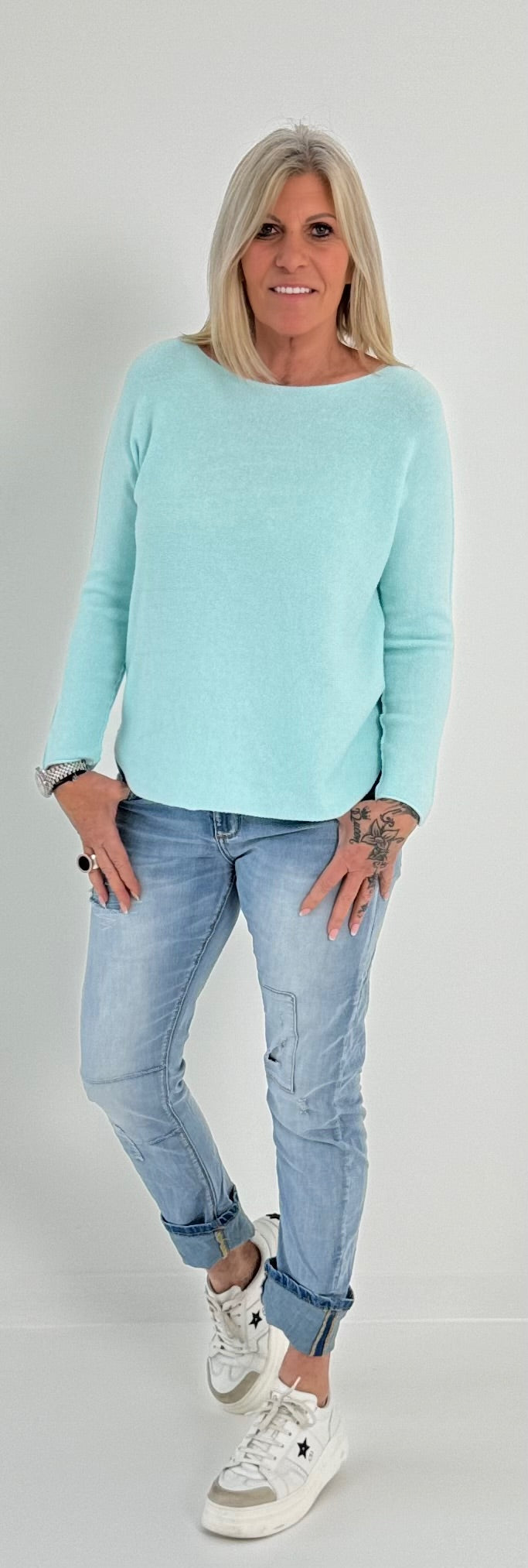 Sweater with round neck and left seam on the arm model "Lona" - baby turquoise