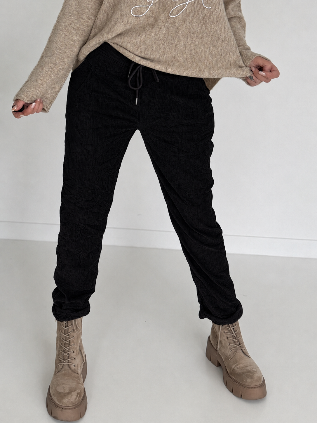 Broek in knit-look met elastische tailleband - zwart