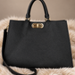 Tasche in Lederoptik mit Twist Lock Verschluss - schwarz