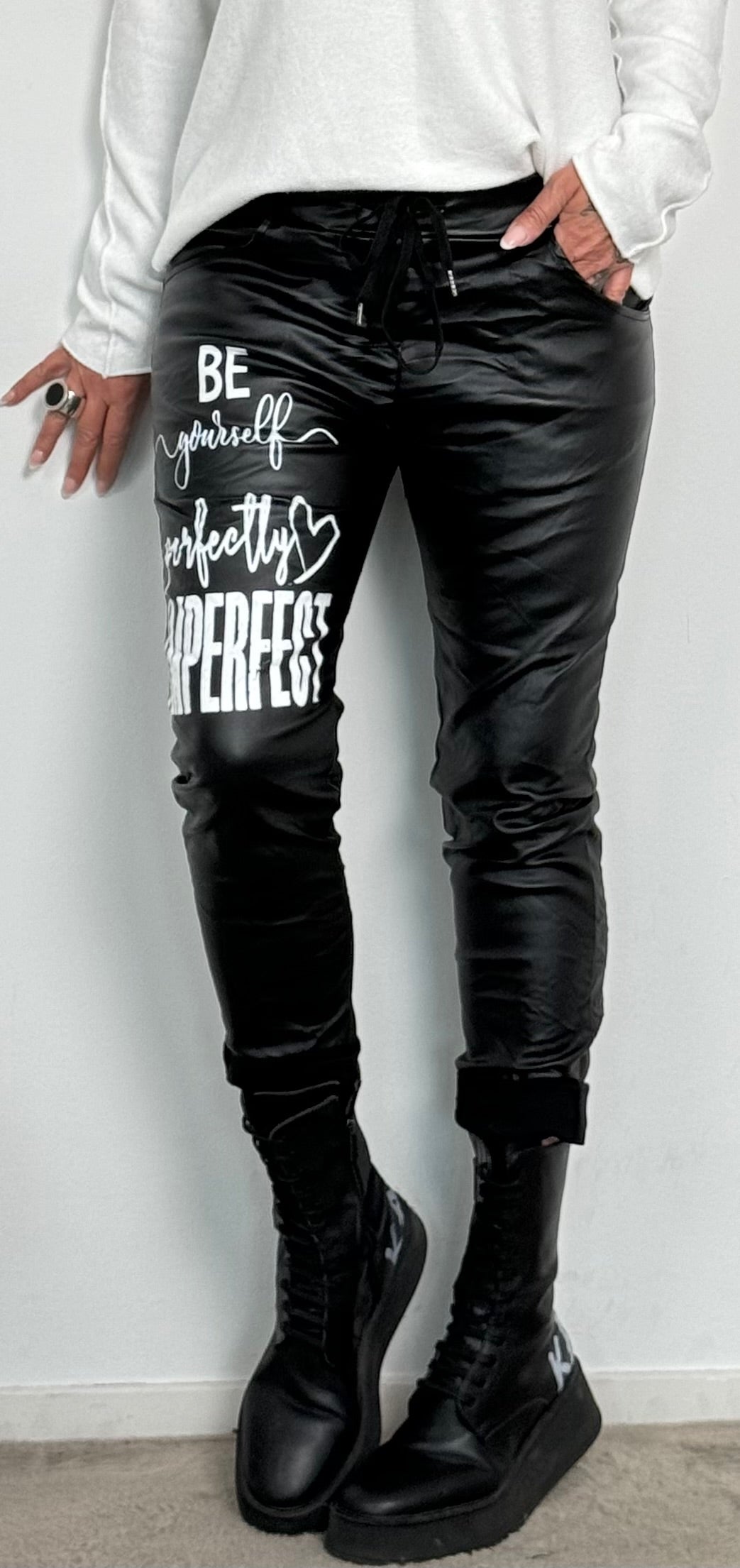 Imitation leather trousers "Be Yourself...." - black