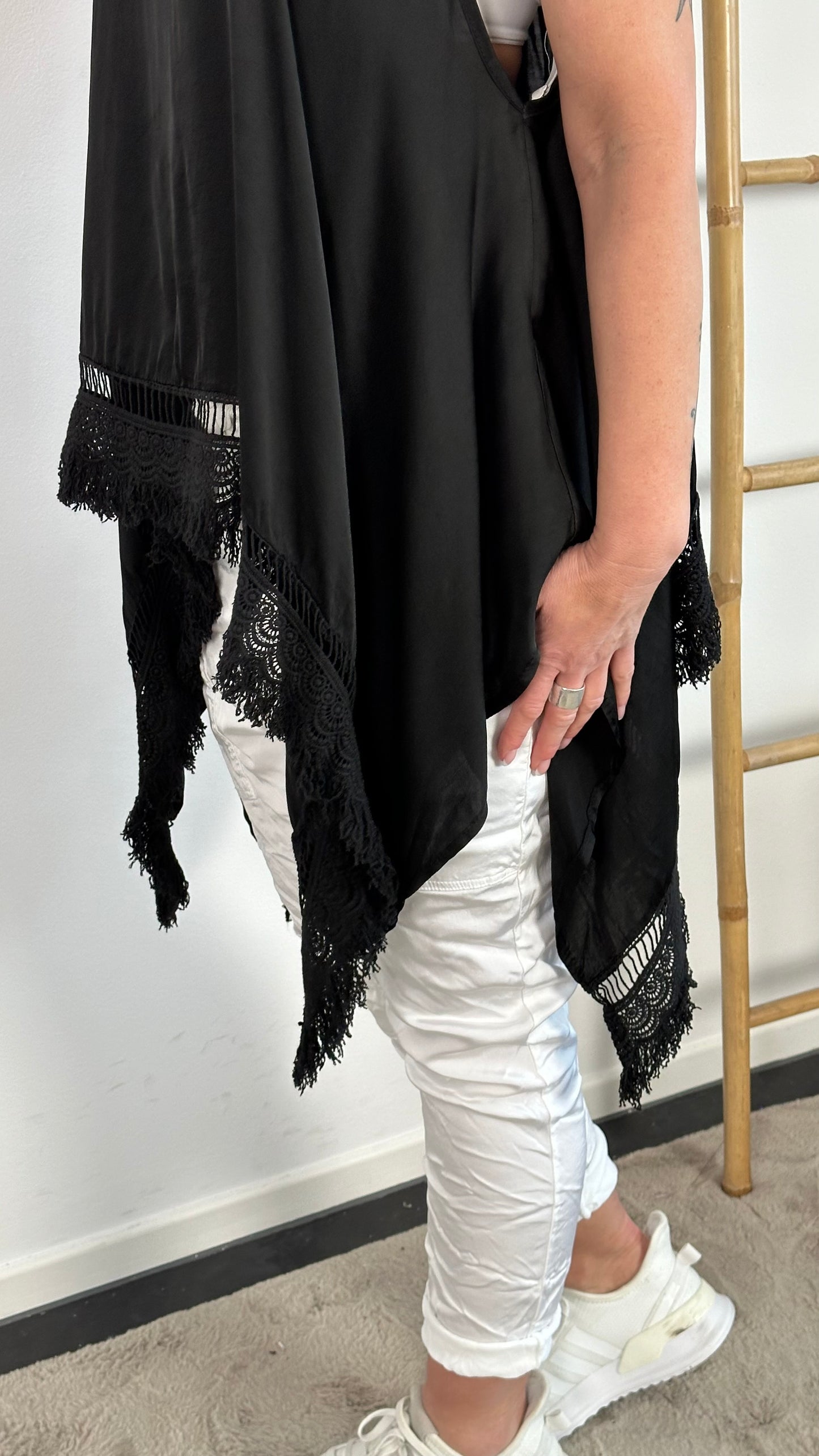 Shiny long top with crochet cuffs and fringes "Malu" - black